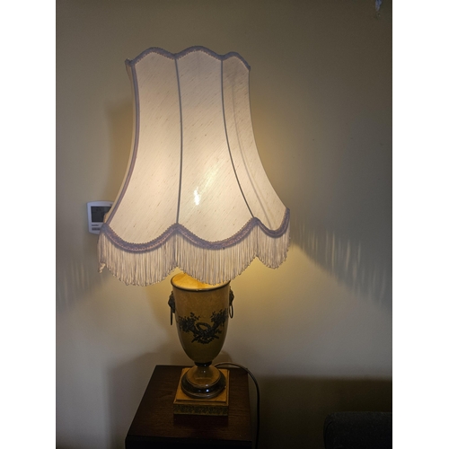 59 - A Good Metal Urn Shaped Table Lamp with shade along with a pricket stand. H74 x D 40 cm approx.