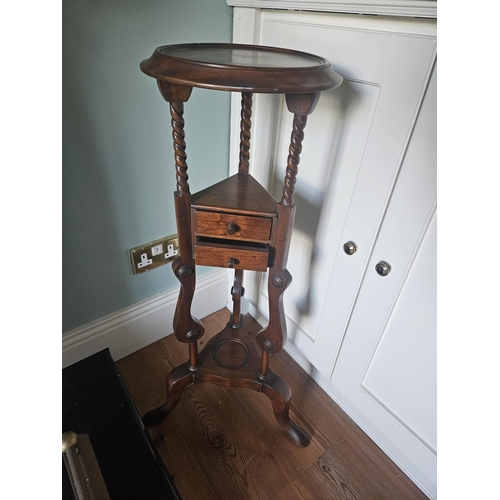 66 - A reproduction Mahogany Lamp Table with twin frieze drawers. H 85 x W 43 cm approx.