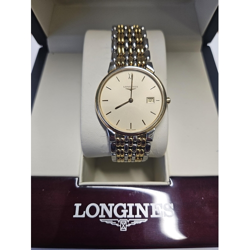 411 - A Gents bio metal Longines Watch in original box, keeping good time according to the owner.