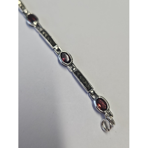 436 - A lovely Silver, Marcasite and Garnet Bracelet.