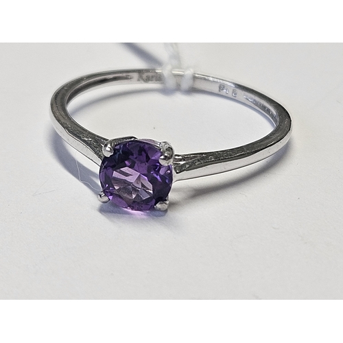 437 - A 9ct Gold and Amethyst solitaire Ring, size S.