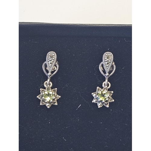 442 - A pair of Silver, Marcasite and Peridot Earrings.