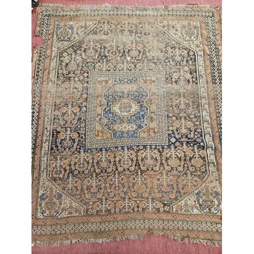 523 - A 19th Century Persian Rug, well worn.
L 204 x W 173 cm approx.