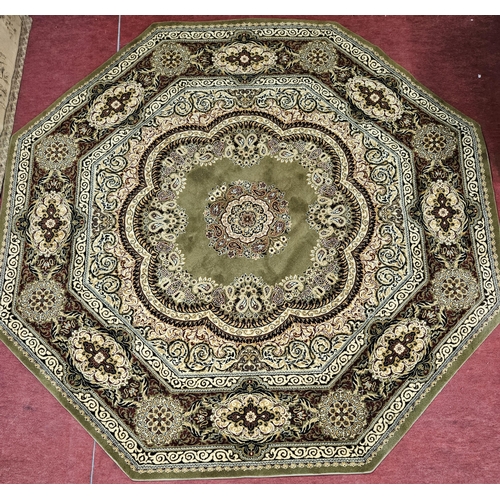 554 - A Fantastic octagonal central Carpet with green ground and unique central medallion design and multi... 