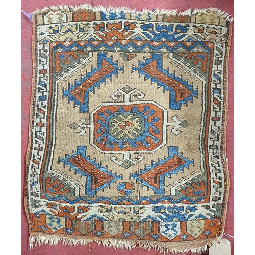 561 - A 19th Century Persian Prayer Mat.
L 64 x W 54 cm approx.