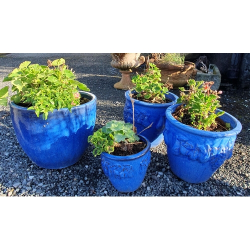 1079 - A group of four Blue glazed Pots.
Largest H 32 x D 38 cm approx.