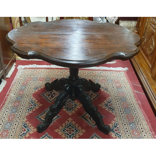 488 - A good 19th Century Continental provincial Centre Table with carved quatrefoil base. 93 x 78 x H 71 ... 