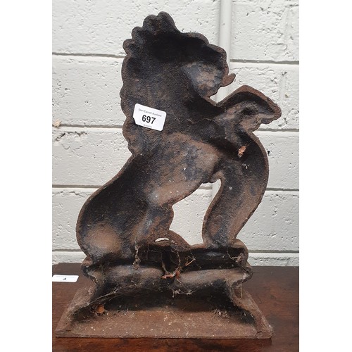 697 - A late 19th early 20th Century standing lion Door Stop. 37 cm tall approx.