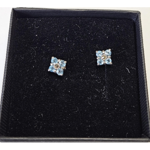 325 - A pair of Silver, Topaz and Marcasite Earrings.