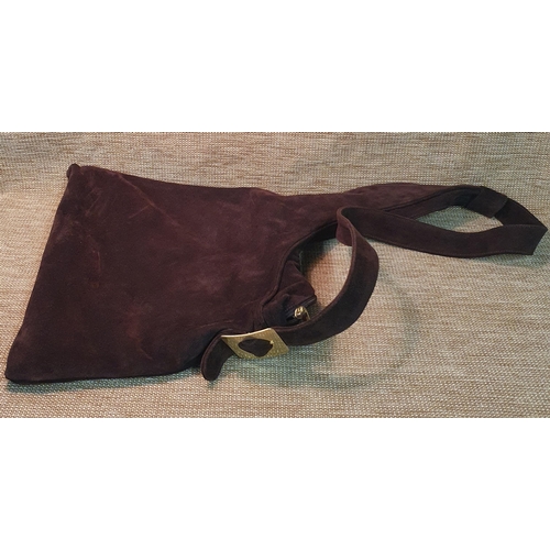 129 - A Russell & Bromley Hand Bag. Brown  Suede. Pre-owned, excellent condition. Retails at €250.