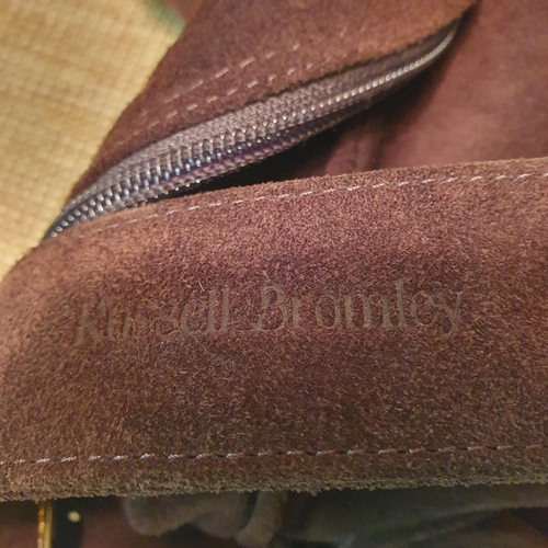 129 - A Russell & Bromley Hand Bag. Brown  Suede. Pre-owned, excellent condition. Retails at €250.