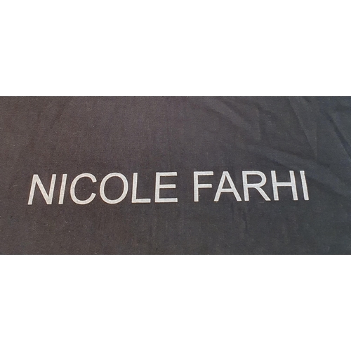 147 - A Ladies Designer Hand Bag by Nicole Farhi .
Black Leather. Pre-owned, excellent condition.