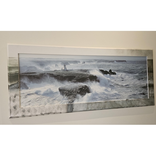 98 - Two coloured Prints of Seascapes, one with a lighthouse. 60 x 97 cm approx.