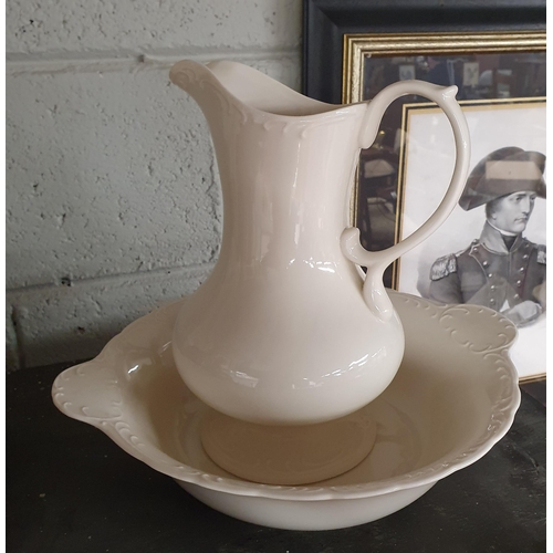 215 - A good early Stoneware hand painted Jug along with an Edwardian mantel clock, a cranberry vase etc.