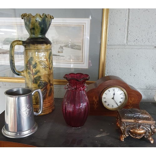 215 - A good early Stoneware hand painted Jug along with an Edwardian mantel clock, a cranberry vase etc.