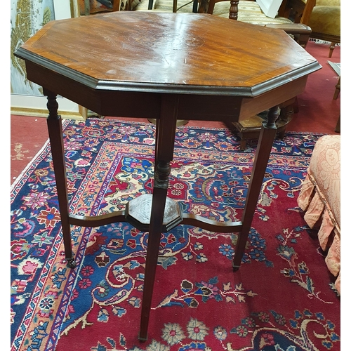 247 - An Edwardian Mahogany and Inlaid Octagonal Side Table on square tapered supports and stretcher base.... 