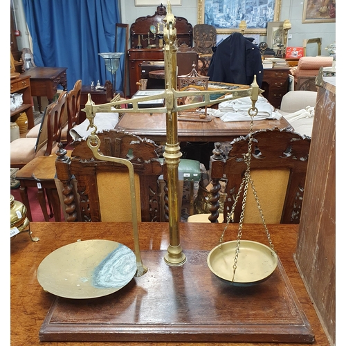 267 - A good early 19th Century Brass Postal Scales on a hardwood base.
H 70 x W 62 cm approx.