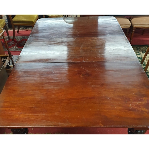 381 - A really good 19th Century Mahogany single leaf Dining Table on turned fluted supports and brass cas... 