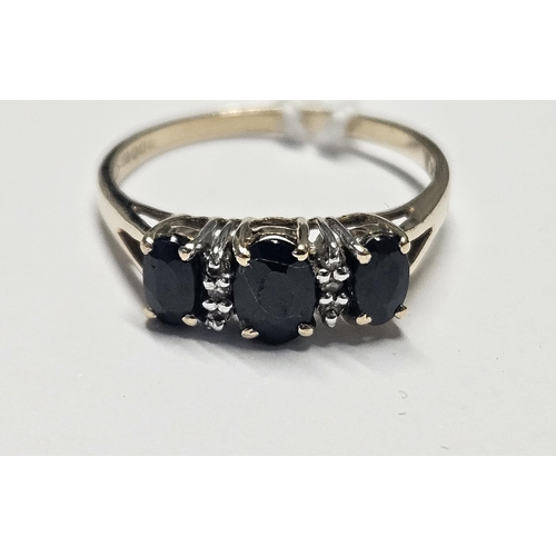 405 - A 9ct Gold, Sapphire and Diamond Ring, size O.