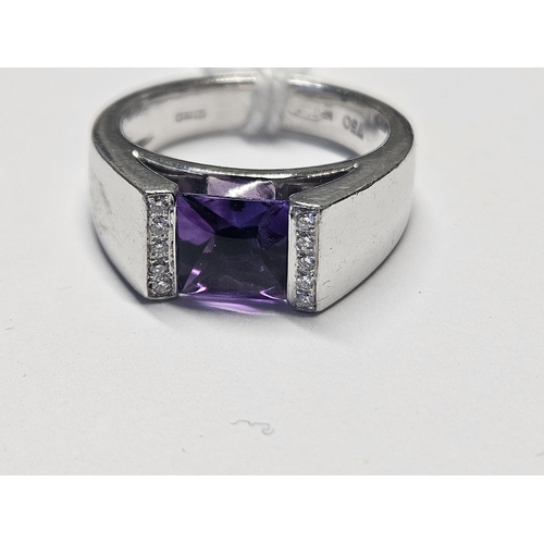 410 - An 18ct Gold, Diamond and Amethyst Ring, 9.5gms approx, size M.