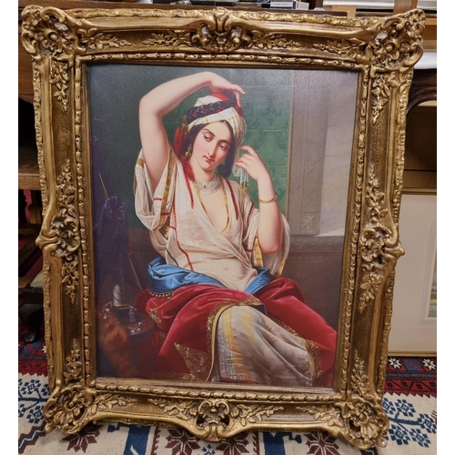 942 - A large Oleograph of a Classical Picture of a beautiful Woman in a highly ornate Gilt Frame. Height ... 