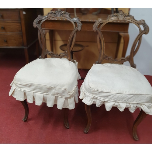 949 - A 20th Century Oak Side Table with carved cabriole supports along with a set of four Victorian walnu... 