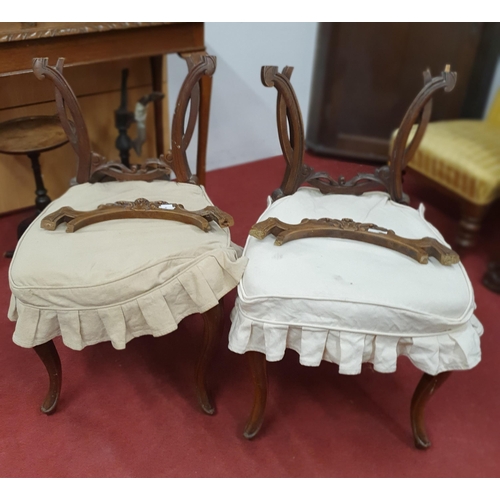 949 - A 20th Century Oak Side Table with carved cabriole supports along with a set of four Victorian walnu... 