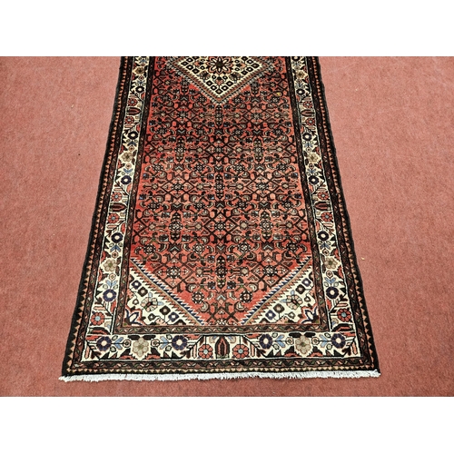 957 - Of Exceptional quality, A washed Red ground full pile Iranian Runner with an Angelus design from the... 