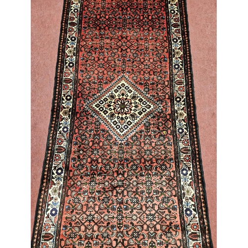 957 - Of Exceptional quality, A washed Red ground full pile Iranian Runner with an Angelus design from the... 