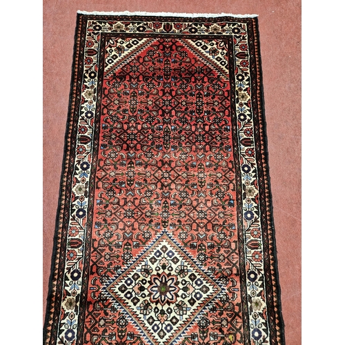 957 - Of Exceptional quality, A washed Red ground full pile Iranian Runner with an Angelus design from the... 