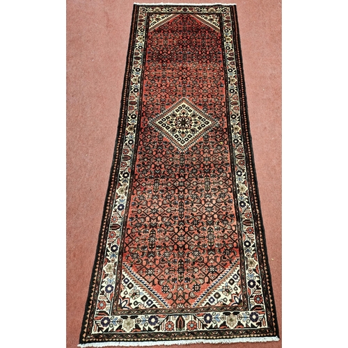 957 - Of Exceptional quality, A washed Red ground full pile Iranian Runner with an Angelus design from the... 