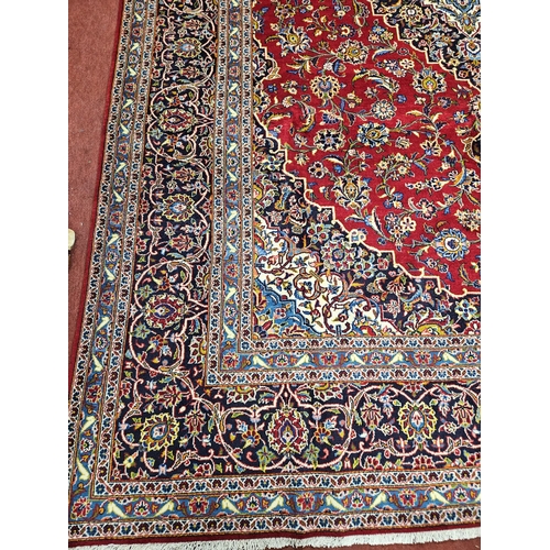 959 - Of Exceptional quality. A very fine hand woven full pile Persian Kashan Carpet with a traditional Ka... 