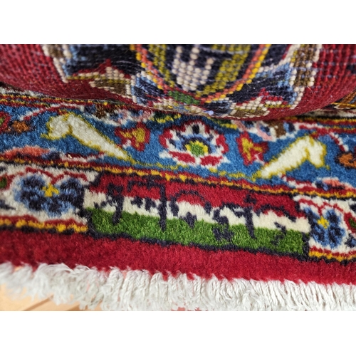 959 - Of Exceptional quality. A very fine hand woven full pile Persian Kashan Carpet with a traditional Ka... 