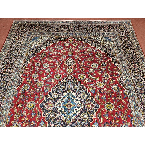 959 - Of Exceptional quality. A very fine hand woven full pile Persian Kashan Carpet with a traditional Ka... 