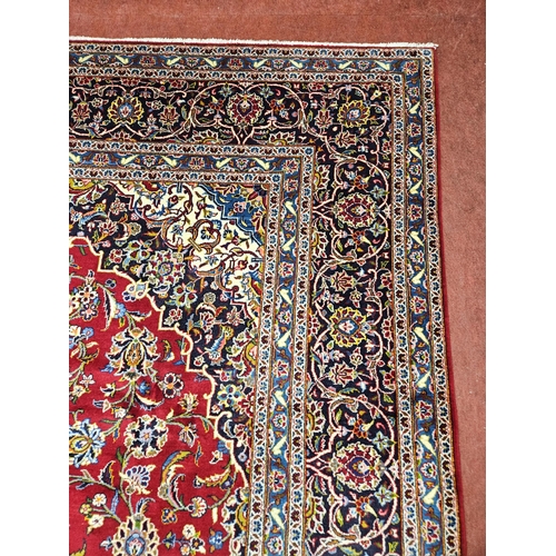 959 - Of Exceptional quality. A very fine hand woven full pile Persian Kashan Carpet with a traditional Ka... 