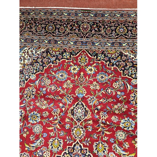 959 - Of Exceptional quality. A very fine hand woven full pile Persian Kashan Carpet with a traditional Ka... 