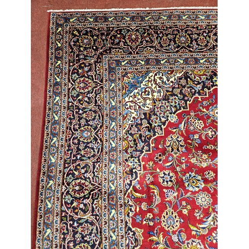 959 - Of Exceptional quality. A very fine hand woven full pile Persian Kashan Carpet with a traditional Ka... 