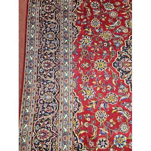 959 - Of Exceptional quality. A very fine hand woven full pile Persian Kashan Carpet with a traditional Ka... 