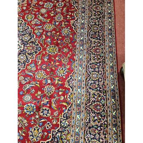 959 - Of Exceptional quality. A very fine hand woven full pile Persian Kashan Carpet with a traditional Ka... 