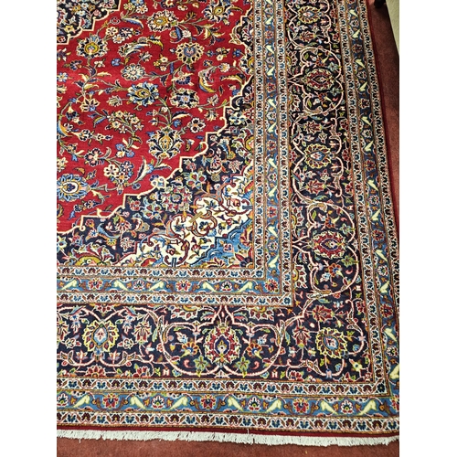 959 - Of Exceptional quality. A very fine hand woven full pile Persian Kashan Carpet with a traditional Ka... 