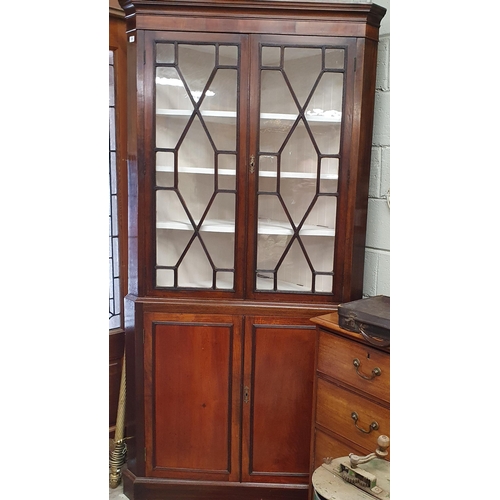 1000 - A 19th Century Mahogany Corner Cabinet with painted interior. W 105 x H 215 cm approx.