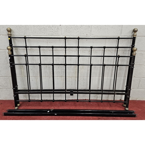 1013 - A Brass and Metal double Bed.
With side rails. H 130 x W 188 x L 205 cm approx.