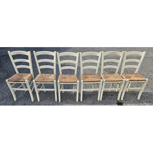 1017 - A good set of six painted Kitchen Chairs with rush seats.