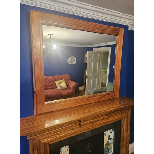 1023 - A reproduction Pine rectangular Mirror.