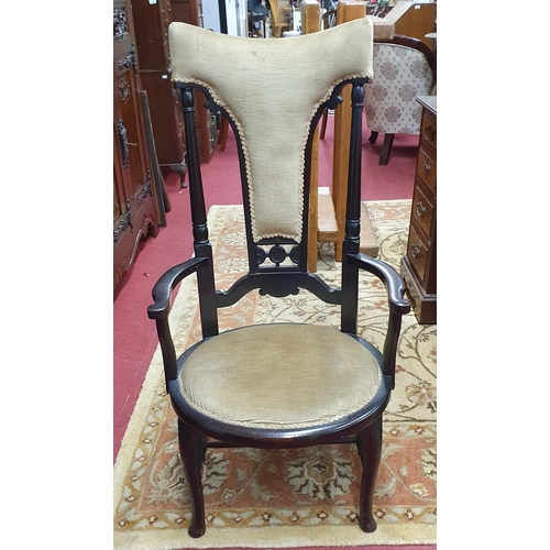 1028 - A late 19th Century Armchair along with a circular coffee table, two fire screens and two chairs.