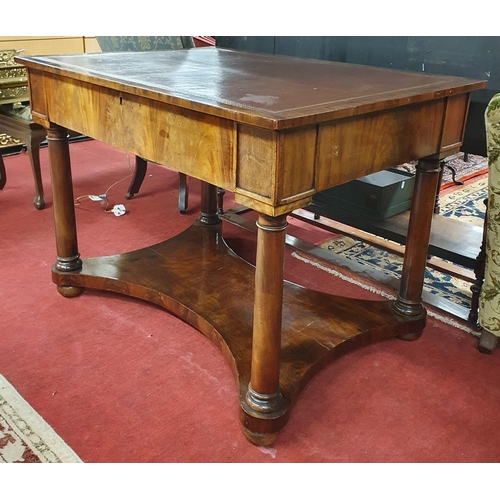 554 - A Regency Mahogany and Veneered Writing Table with brown tooled insert on pillared supports.
W1 106 ... 