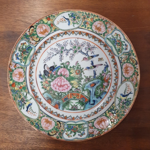 650 - A 19th Century Oriental hand painted Plate. D 24.5 cm approx.