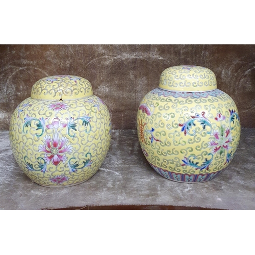 652 - Two yellow ground Ginger pots with lids (one lid AF).