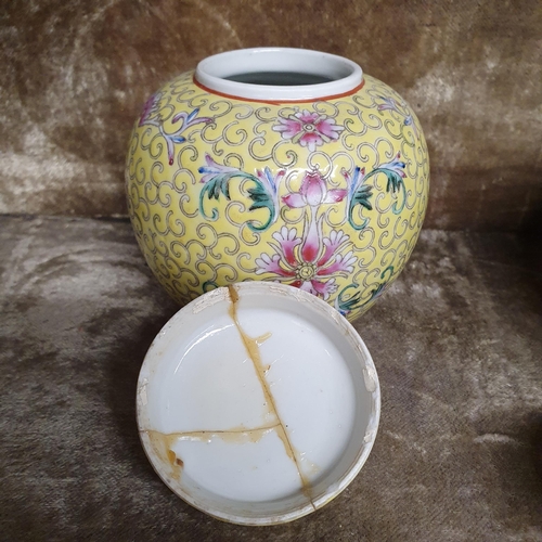 652 - Two yellow ground Ginger pots with lids (one lid AF).