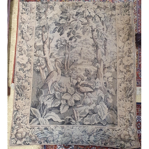 596 - A 19th Century Tapestry of a country scene depicting cranes beside a lake in a wooded setting. 280 x... 